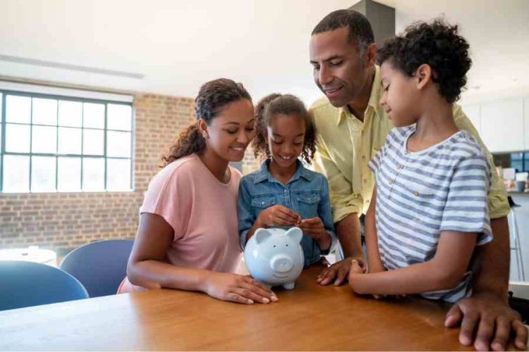 parents and kids making a family budget